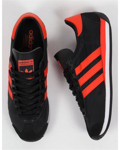 adidas sneaker oranje streep|Adidas black and orange shoes.